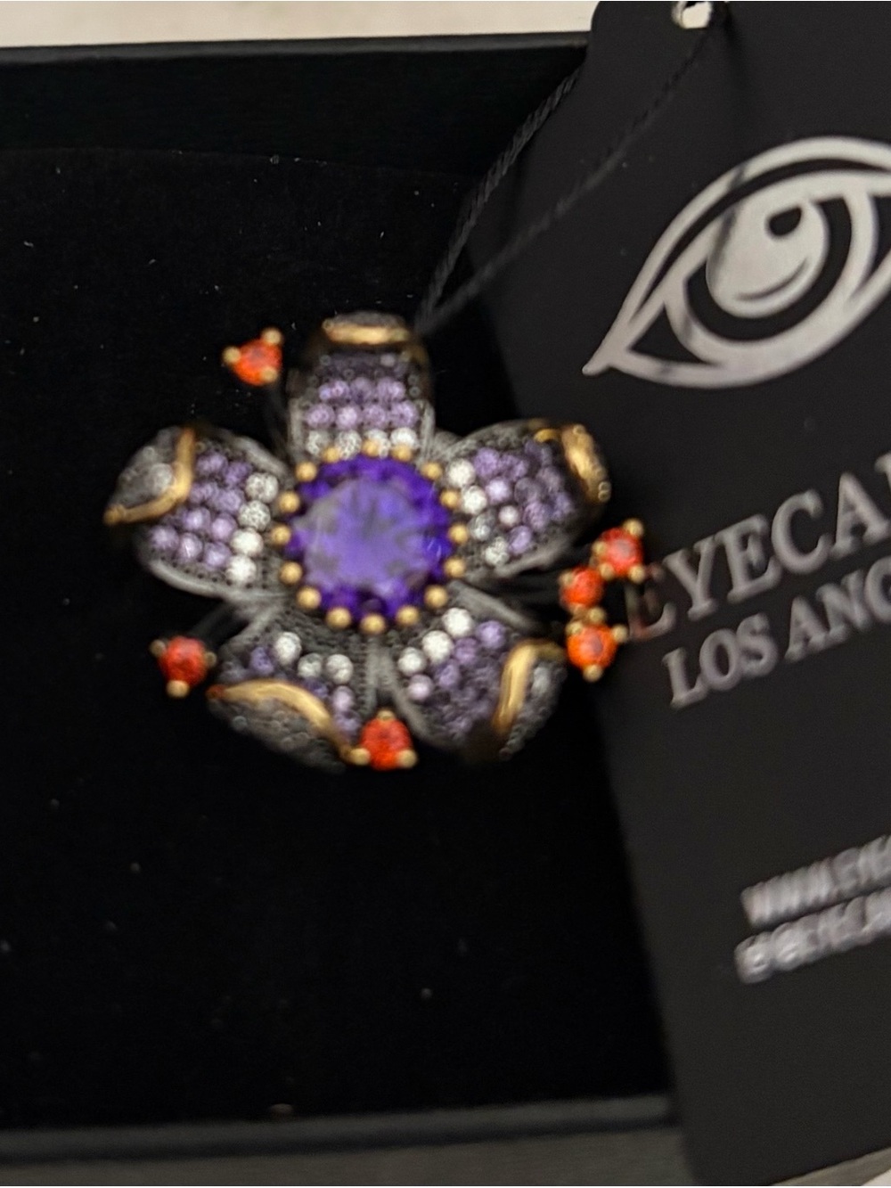 Eye Candy Floral Purple Crystal Ring with Orange Accents
